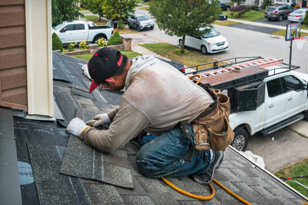 Professional Roofing technician working in Manchaug, MA
